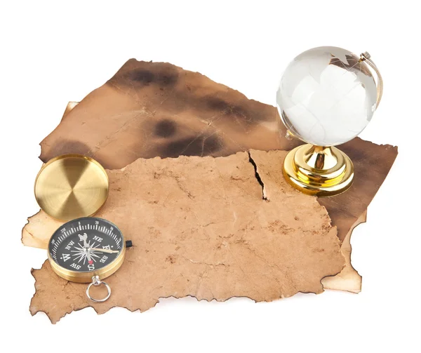 Глобус, компас и старая бумага — стоковое фото