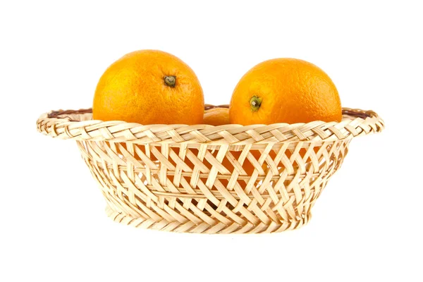 Oranges in a basket — Stock Photo, Image