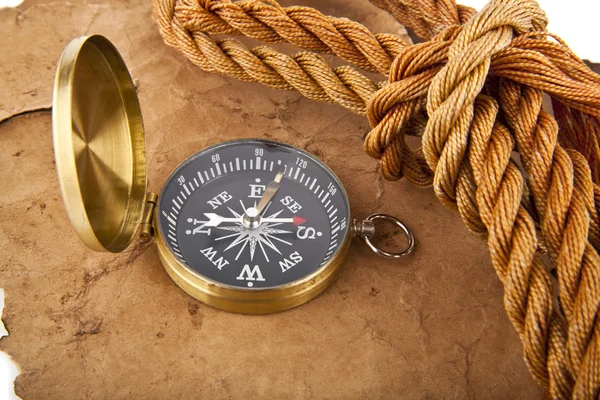 Old paper and a compass — Stock Photo, Image