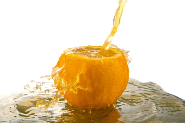 Orange juice splashing — Stock Photo, Image