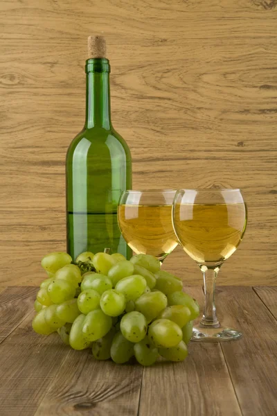 Glasses of wine and bottle — Stock Photo, Image