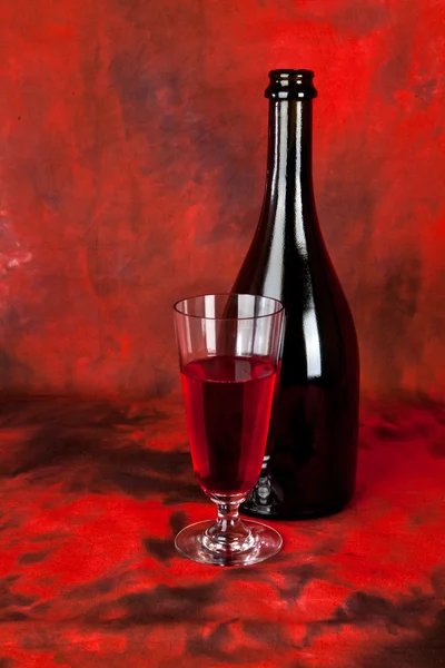 Glass and bottle of wine — Stock Photo, Image