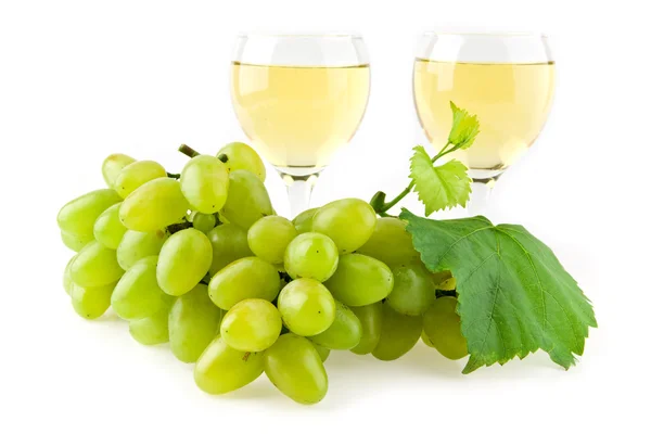 Glasses of wine and cluster of vine — Stock Photo, Image