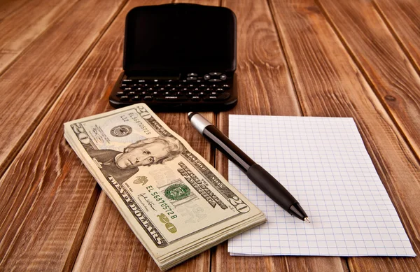 Dollars,paper and a pen — Stock Photo, Image