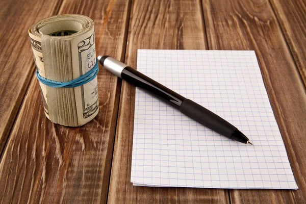 Dollar, Papier und Stift — Stockfoto