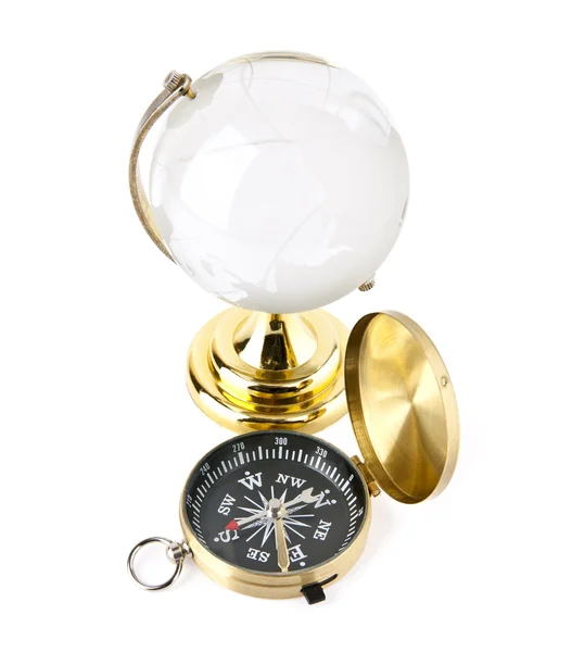 Compass and the globe — Stock Photo, Image