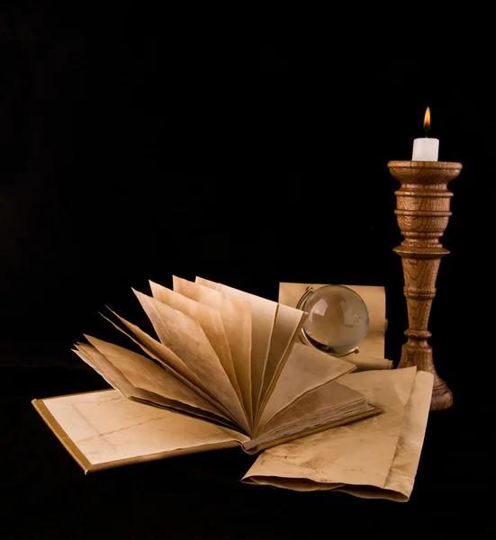 Candle and old book — Stock Photo, Image