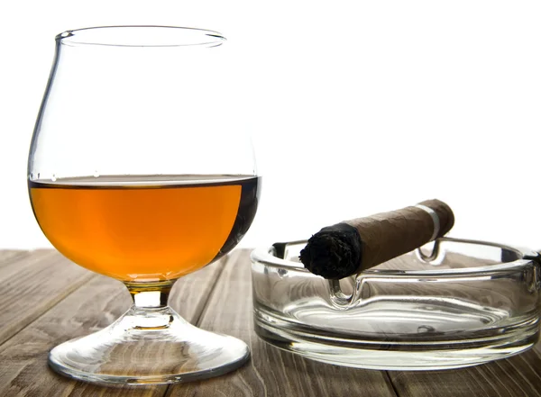 Glass with a cigar — Stock Photo, Image