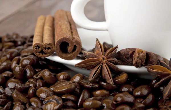 Cup of coffee and seasoning — Stock Photo, Image