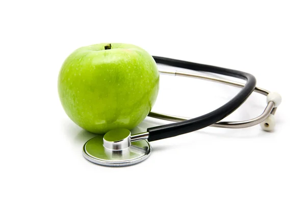 Apfel und Stetoskop — Stockfoto