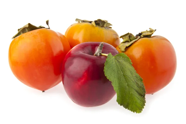 Persimmon and apple — Stock Photo, Image