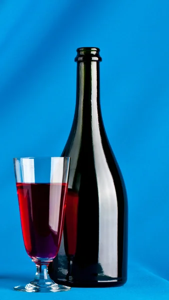 Glass and bottle of wine — Stock Photo, Image