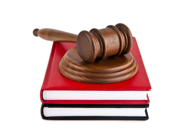 Wooden mallet and a book — Stock Photo, Image