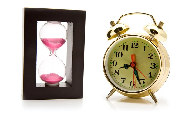 Sand-glasses and alarm clock — Stock Photo, Image
