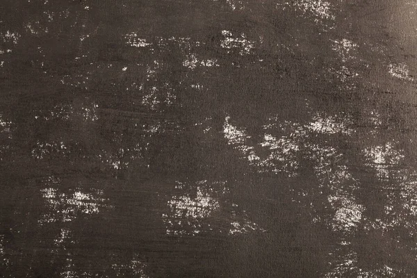 Texture of black paint as a background. Detail for design. Design elements. Macro. Full focus. Background for business cards, postcards and posters.