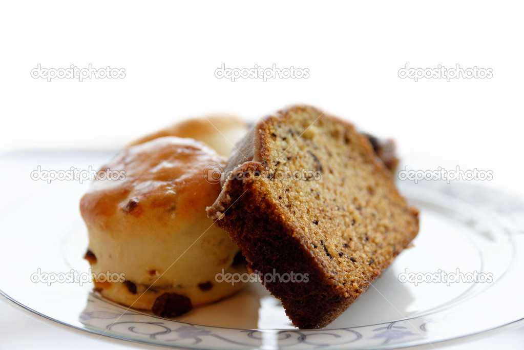 Slice of cake and scones