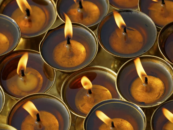 Butter lamps in a monastery — Stock Photo, Image
