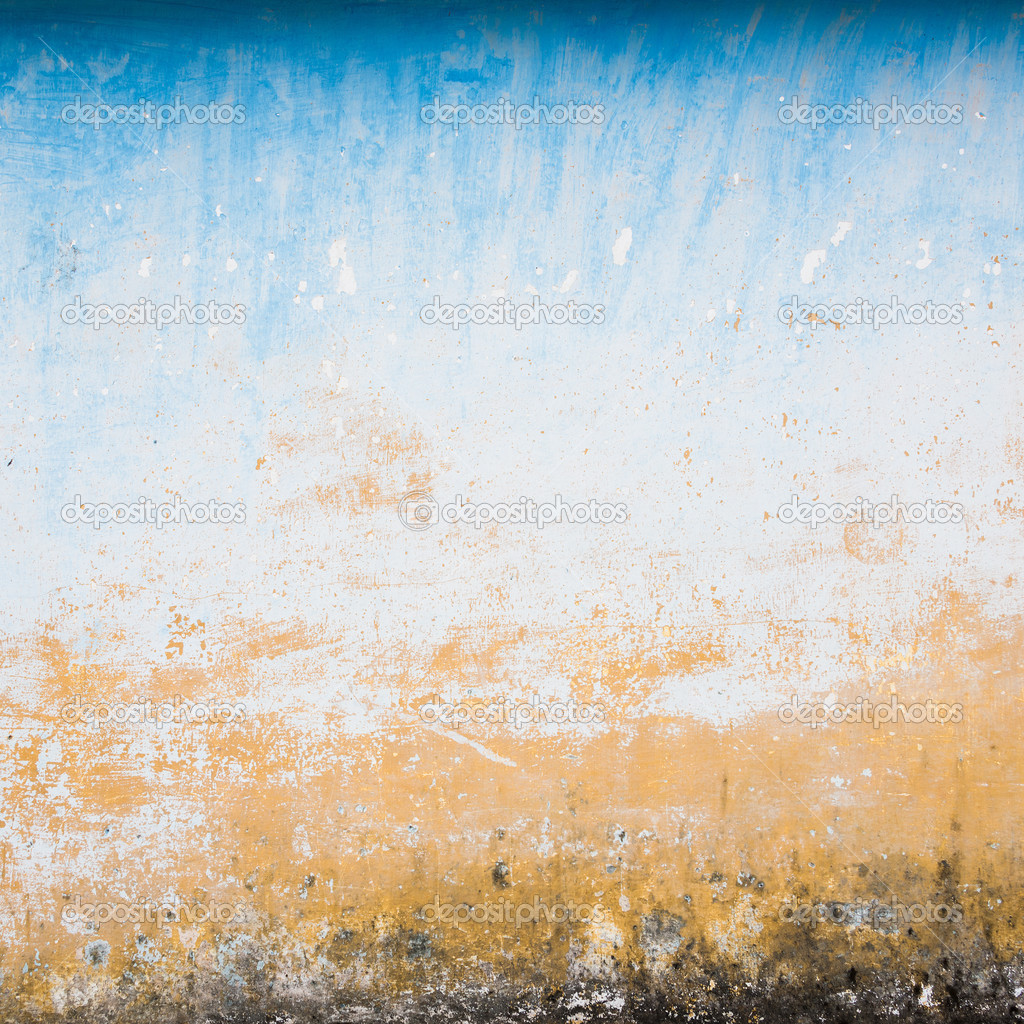 Dilapidated beige and blue wall texture