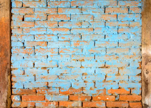 Pared de ladrillo pintado azul — Foto de Stock