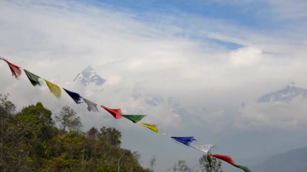 The Machapuchre and prayer flags in the foreground — Stock Video