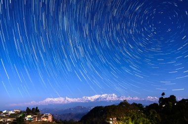 Star trails over Bandipur, Nepal clipart