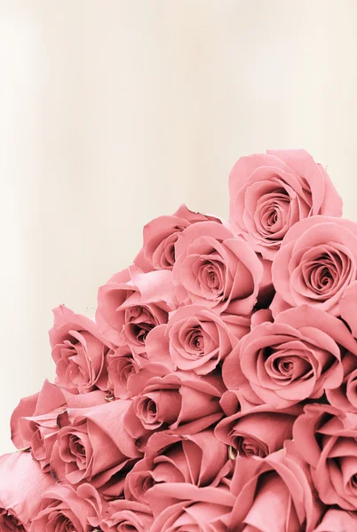 Bouquet of roses on a faded background paper — Stock Photo, Image