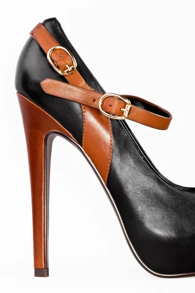 Female black shoes with a heel piece and a fastener — Stock Photo, Image