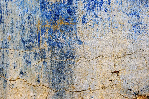 Strukturierter Hintergrund der alten Mauer mit Spuren blauer Farbe — kostenloses Stockfoto