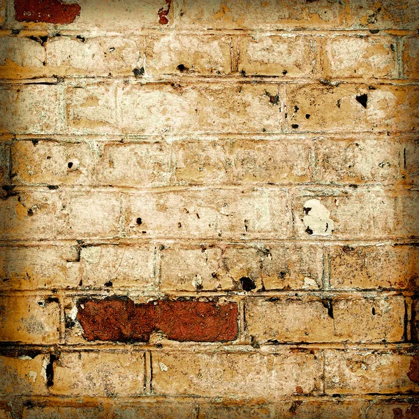 Gelbes Mauerwerk als Grunge-Hintergrund — kostenloses Stockfoto