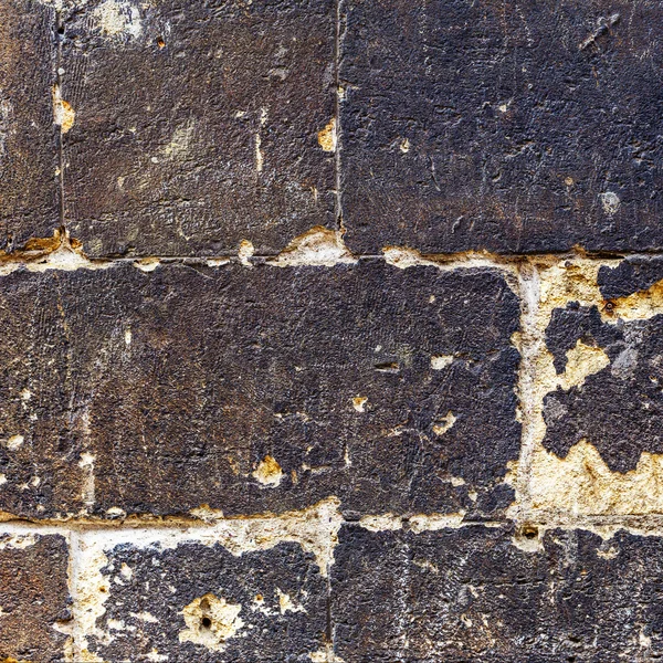 Vecchio muro di mattoni in un'immagine di sfondo — Foto Stock