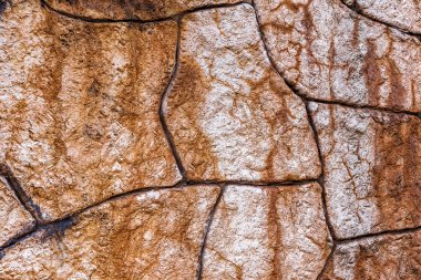 Doğal taştan örülmüş duvar. arka plan olarak kullanılabilir