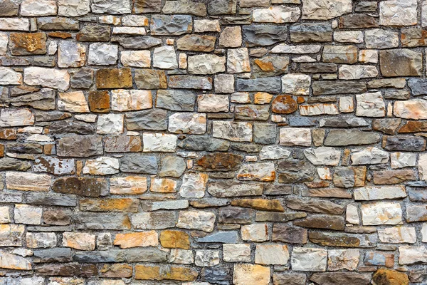 Mur byggd av natursten — Stockfoto