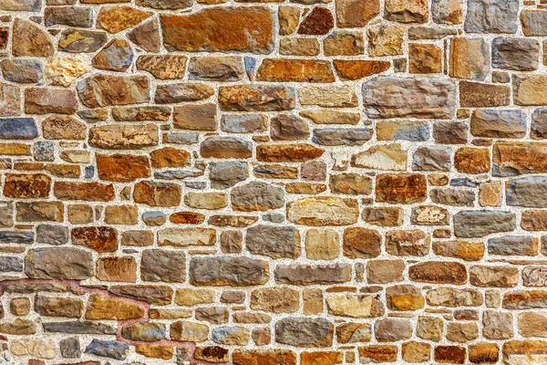 Mur byggd av natursten — Stockfoto