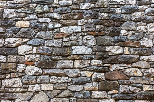 Parede construída de pedra natural — Fotografia de Stock