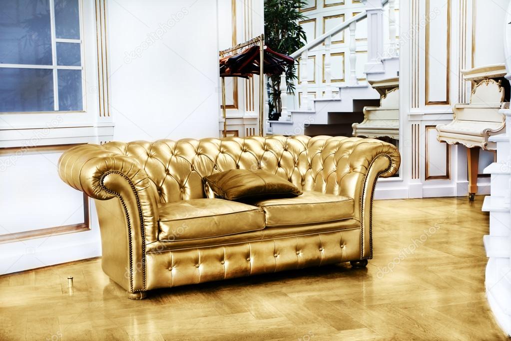 Beautiful vintage gold sofa next to wall (retro-style illustrati