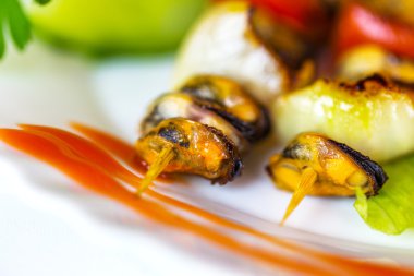 yaratıcı kızarmış midye otlar, seçici odak ile hizmet veren. 