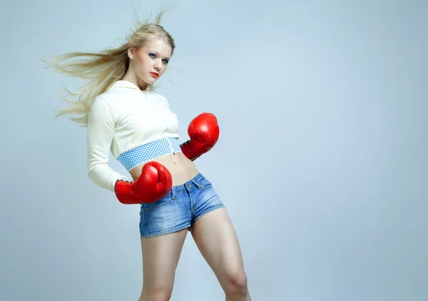 Young beautiful woman during fitness and boxing — Stock Photo, Image