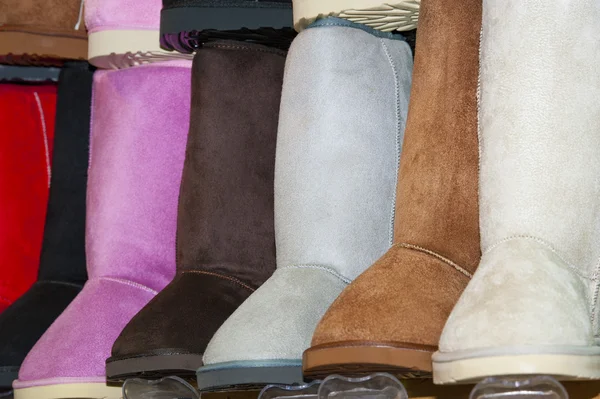 Selection of boots at a shoe stall — Stock Photo, Image