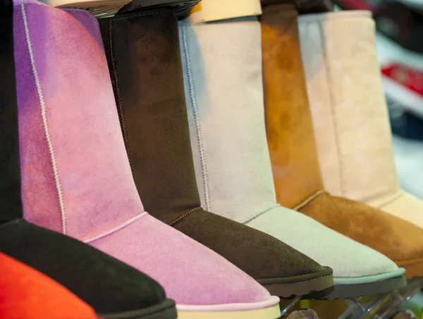 Selection of boots at a shoe stall — Stock Photo, Image