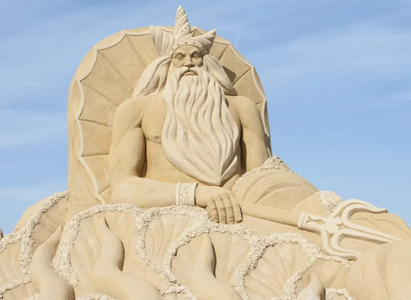 Sand sculpture of greek god poseidon — Stock Photo, Image