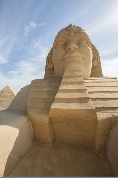 Sand sculpture of egyptian sphinx — Stock Photo, Image