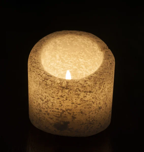 Ornate salt candle on black background — Stock Photo, Image