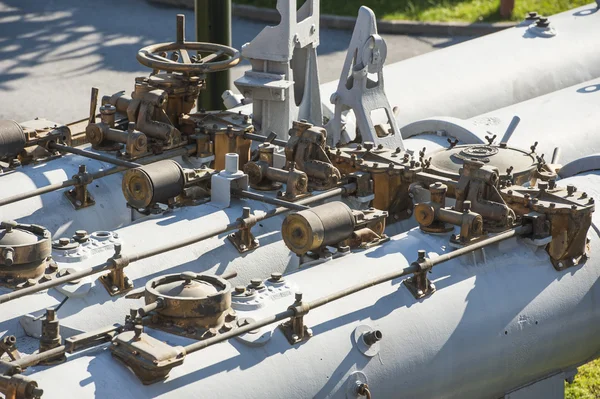 Valves and piping on large naval gun — Stock Photo, Image