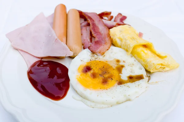 Breakfast in white ceramic dish — Stock Photo, Image