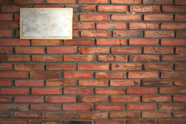 Dirty Sign on Old brick wall — Stock Photo, Image