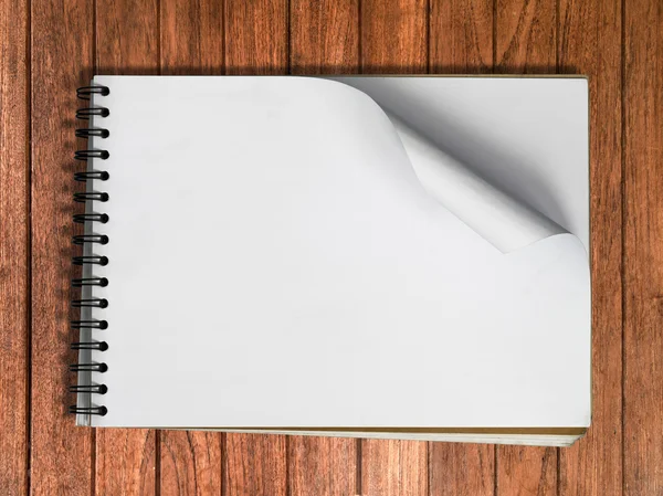 Biały szkicu książki jedną stronę poziome na drewno — Zdjęcie stockowe