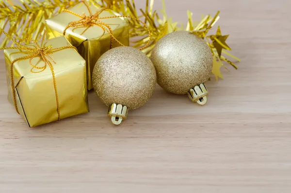 Gold Christmas bauble and Two Present Boxes — Stock Photo, Image