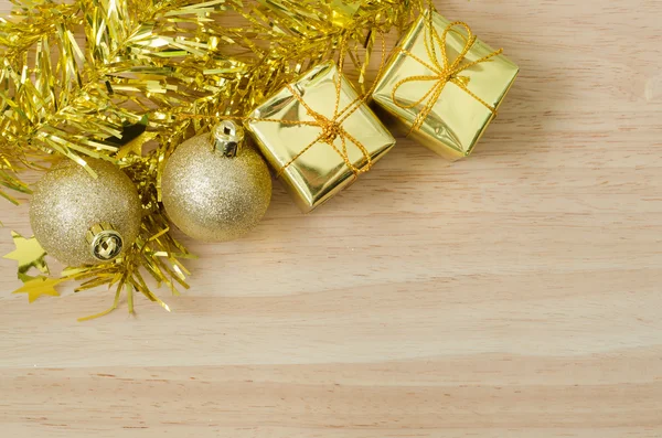 Gold Christmas bauble and Two Present Boxes — Stock Photo, Image