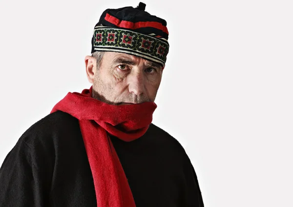 Muž nosí barevný klobouk — Stock fotografie