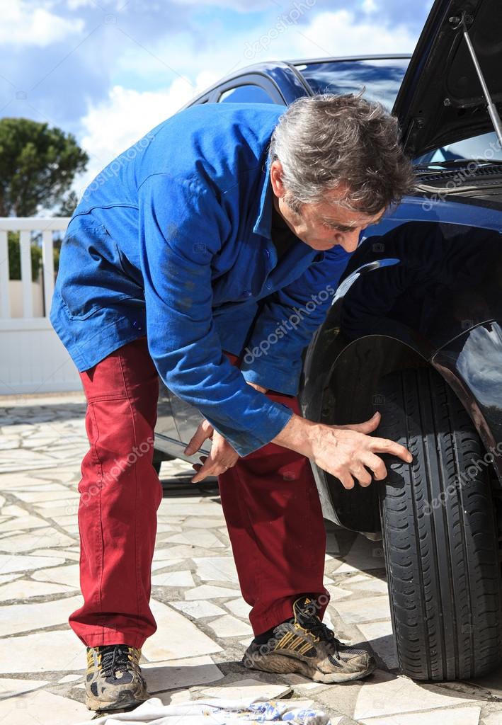 Inspection of tires Stock Photo by ©delkoo 23384086